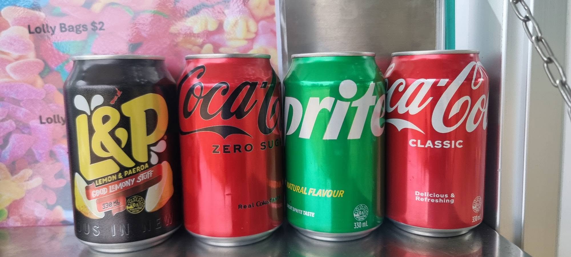 Cold drinks available at JOJO'S Pizza: Coca-Cola, Coke Zero Sugar, Sprite and L&P