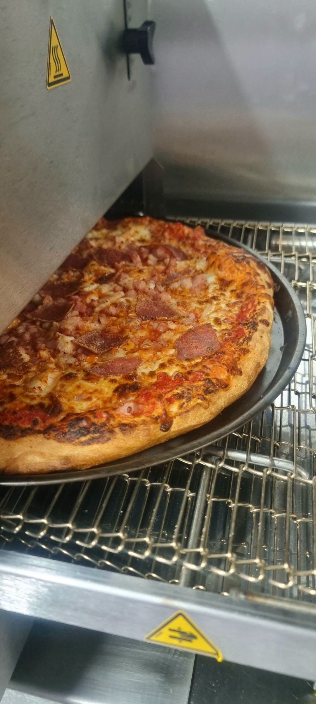 Meat Lovers pizza fresh from the oven